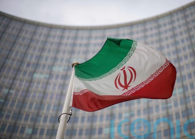 Iran rejects UN atomic agency resolution and threatens reprisal actions