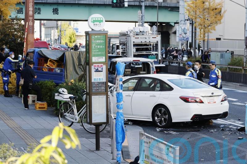 Man arrested in Tokyo on suspicion of hitting 11 people with car, killing one