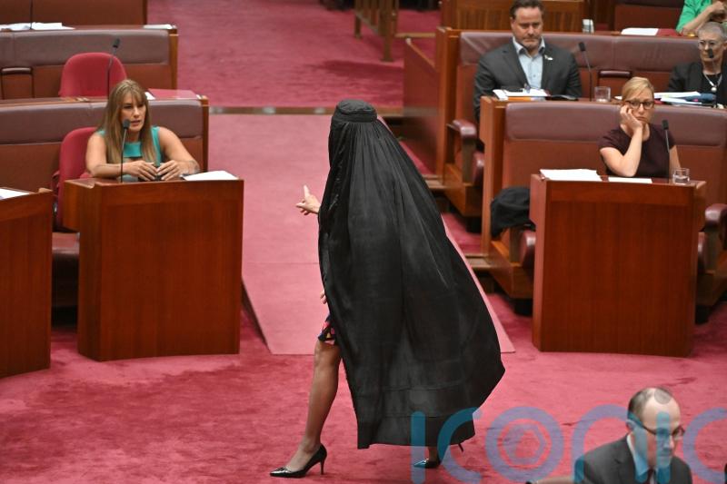 Australian senator suspended from Parliament for wearing burka in protest