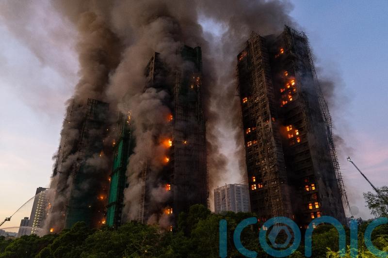 13 dead as fire rages through Hong Kong high-rise residential complex