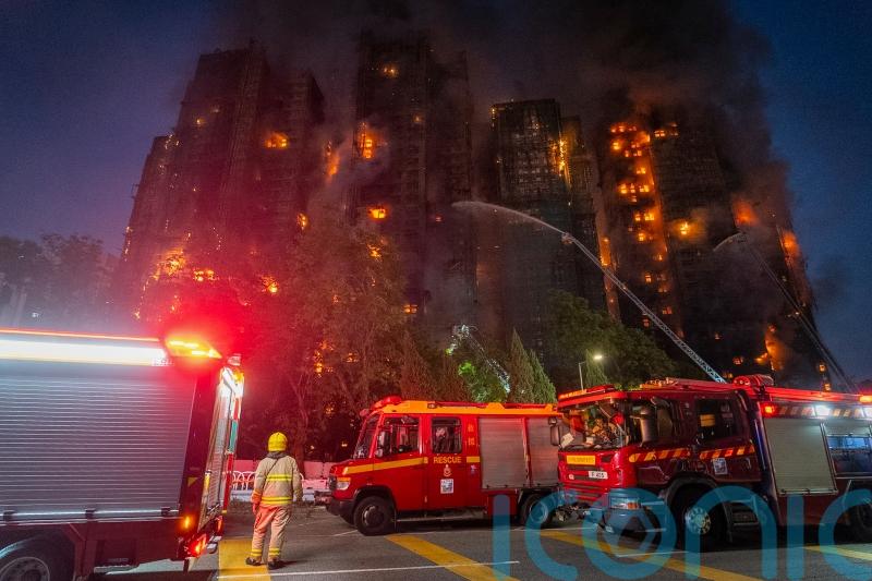 Three arrested in Hong Kong as tower blocks fire leaves at least 44 dead