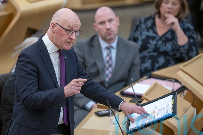 Use cash freed up by end of two-child cap to cut income tax, Swinney urged