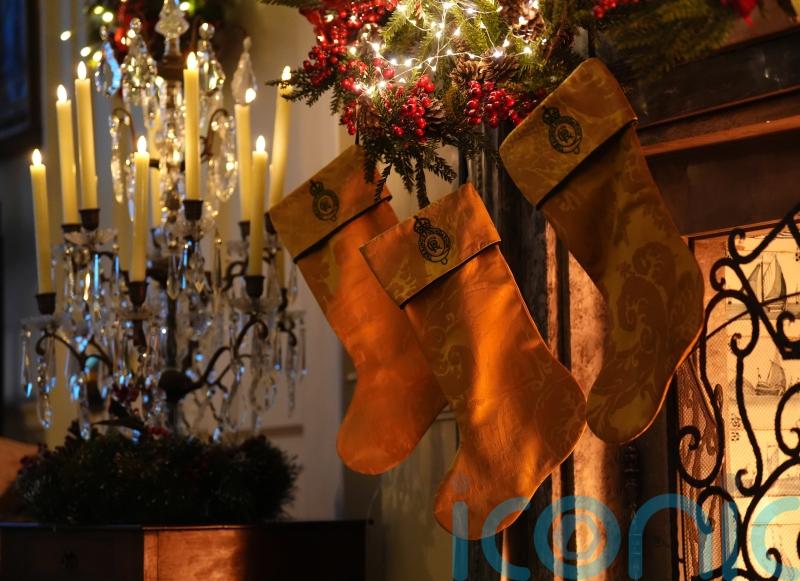 Sandringham curtains recycled into festive stockings for royal charity auction
