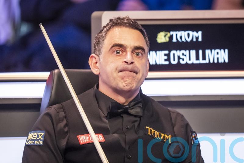 Ronnie O’Sullivan suffers first-round defeat to Zhou Yuelong in UK Championship