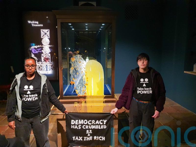 Protesters throw crumble and custard at Crown Jewels in Tower of London stunt