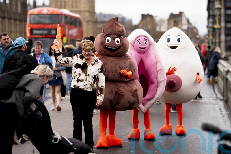 Clare Balding leads mascots through London urging people to get cancer screening