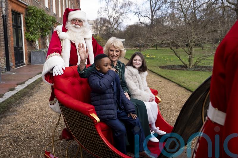 Camilla joins youngsters in Queen Victoria’s former sled at Clarence House party