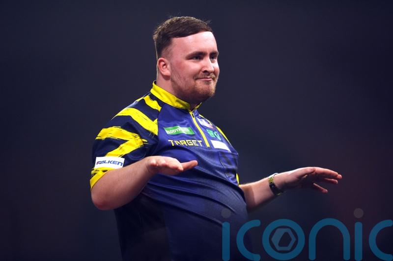 Luke Littler kicks off World Championship title defence with comfortable win