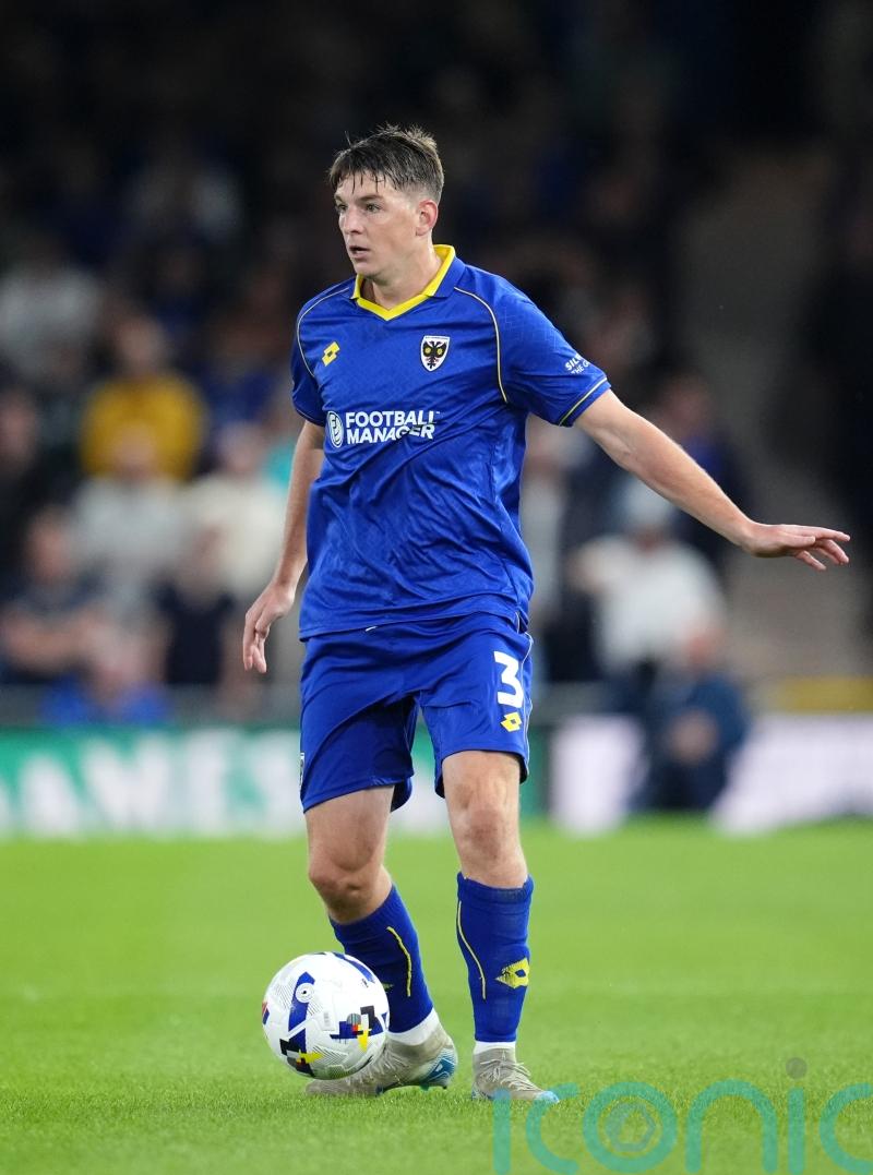 Wimbledon’s winless run extended to six games after goalless draw with Mansfield