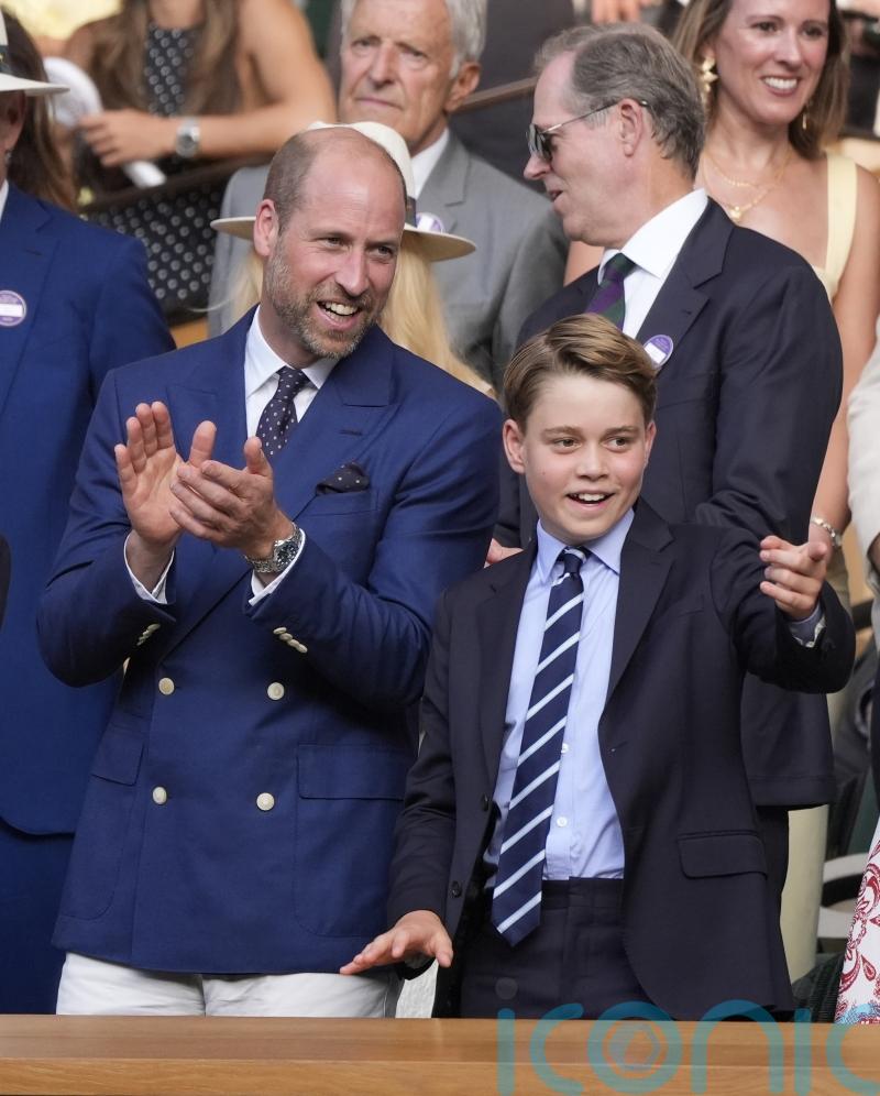 William and George don aprons to help with Christmas lunch at homeless shelter