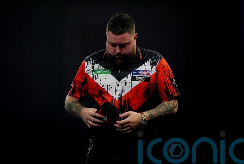 Former world champion Michael Smith among seeds to crash out in second round