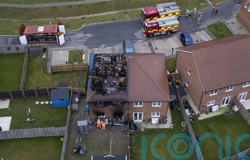 Remaining hotspots extinguished at scene of house fire that killed teenage girl