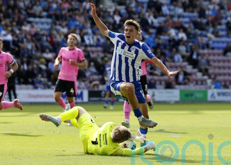 Wigan get back to winning ways at Burton