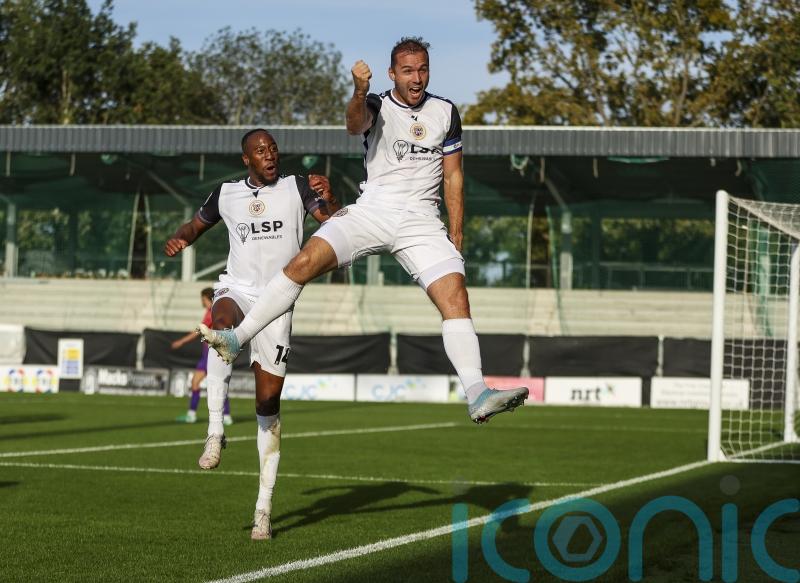 Michael Cheek&rsquo;s hat-trick sends Bromley top of League Two