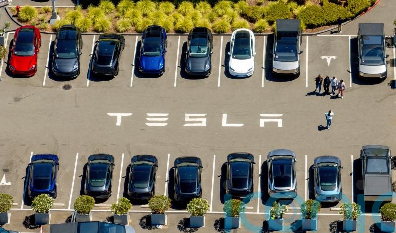 Tesla loses title as world&rsquo;s biggest electric vehicle maker as sales fall again