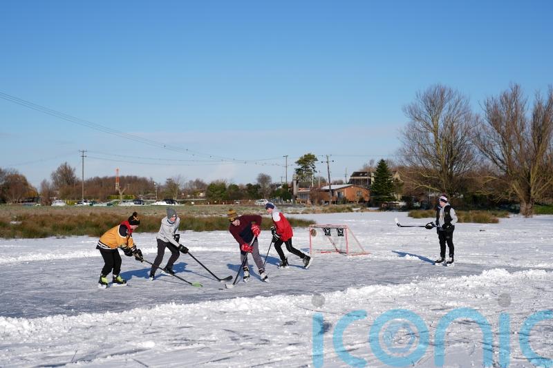 Schools closed and flights cancelled as warnings for snow and ice in force