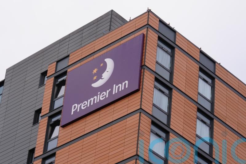 Stocks slip as Whitbread tops FTSE 100