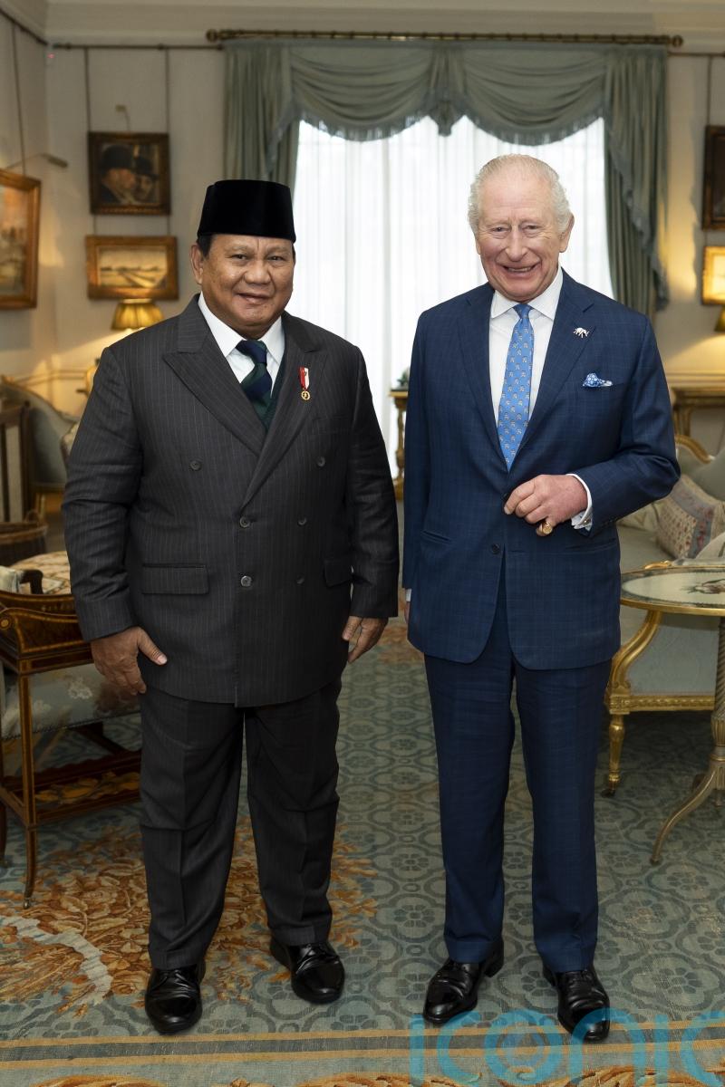 King back in London carrying out duties as Harry prepares to enter witness box