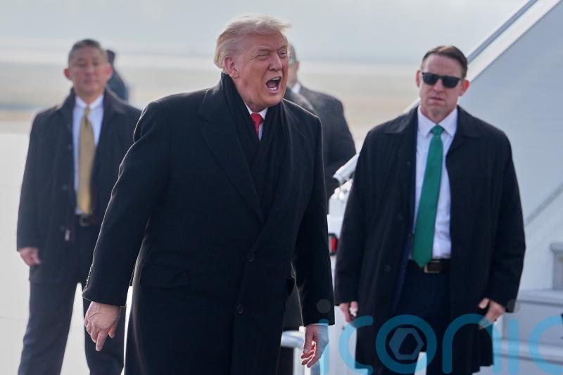 Trump arrives in Switzerland after plane issue delays journey