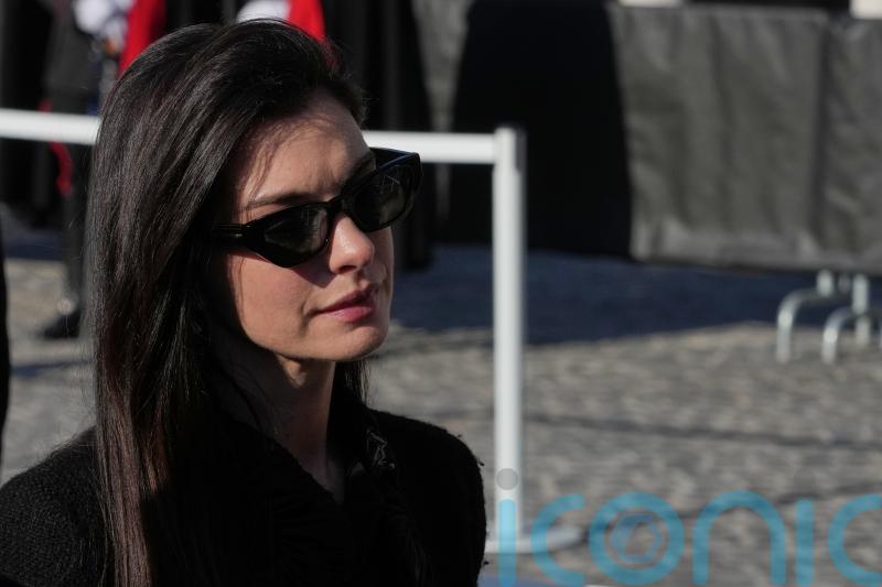 Anne Hathaway and Liz Hurley among celebrities at Valentino funeral in Rome