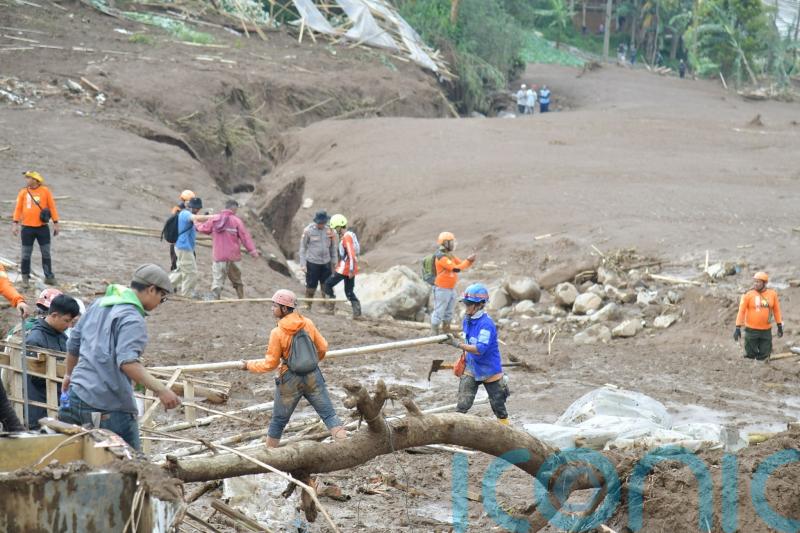 Dozens missing after landslide hits village in Indonesia
