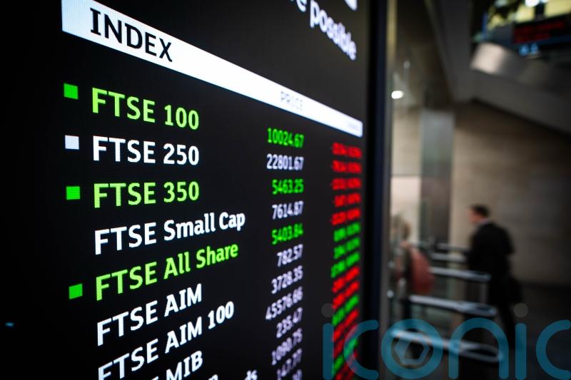 Pound climbs as miners help FTSE 100 nudge higher