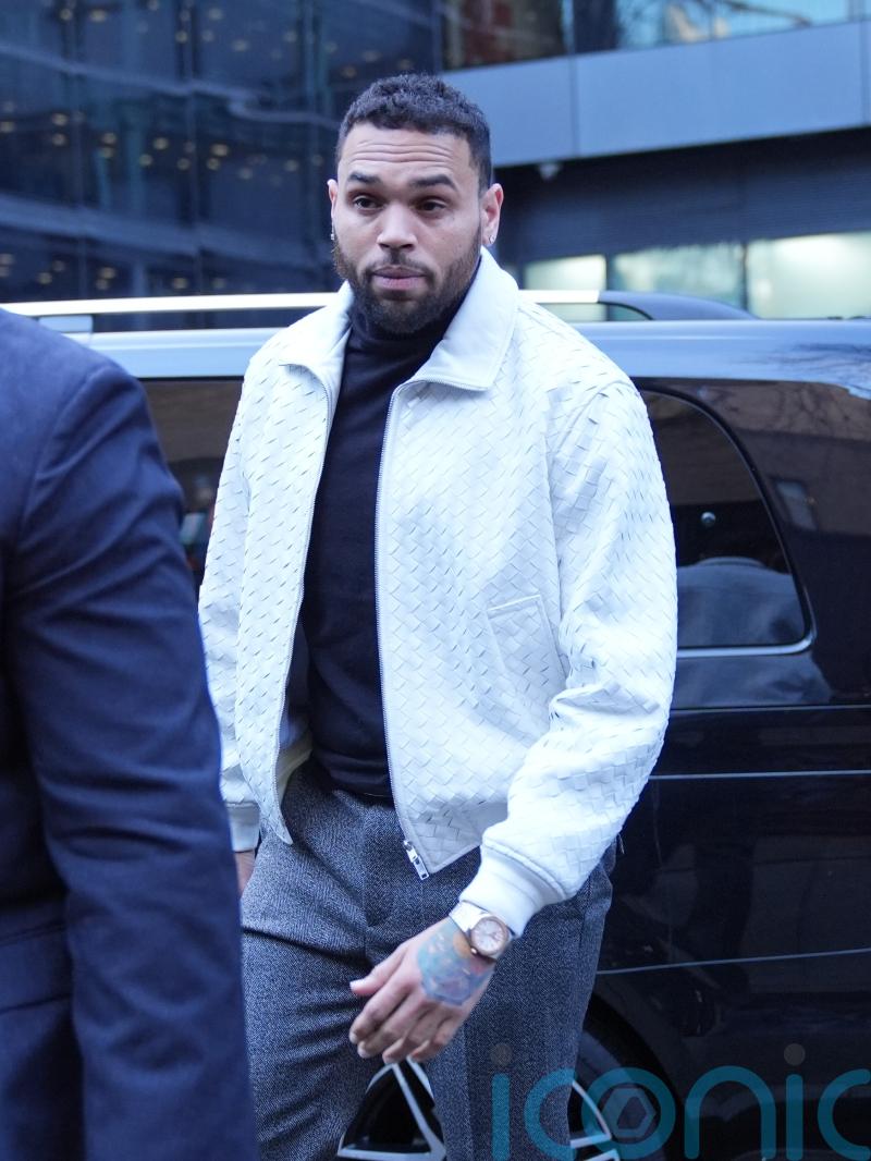 Chris Brown appears at London court in &lsquo;bottle attack&rsquo; case