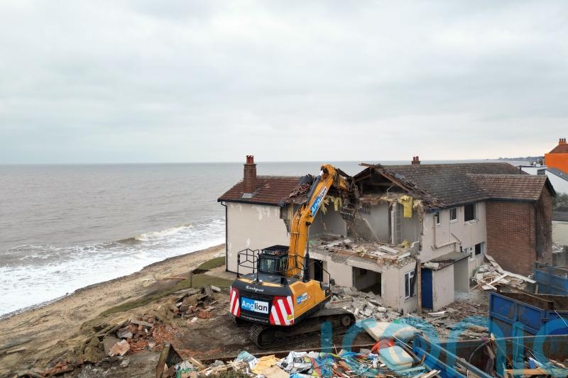 Demolition of six more homes begins in erosion-hit seaside village
