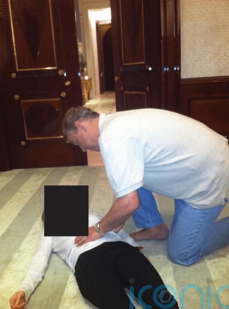 Pictures appear to show Andrew crouched over woman in latest Epstein files dump