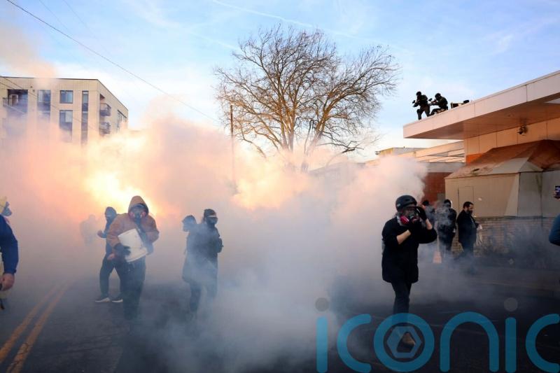 Portland mayor demands immigration enforcement leave city after using tear gas