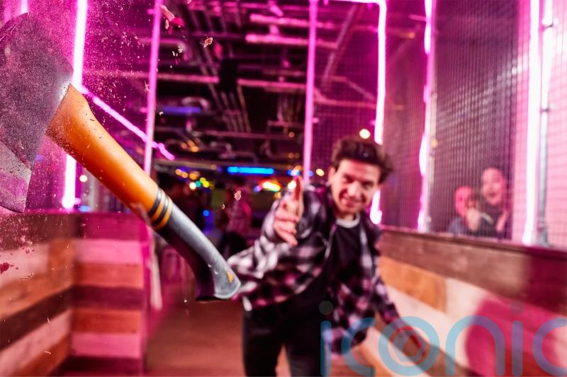 Axe-throwing and escape room firm warns on profits amid consumer weakness