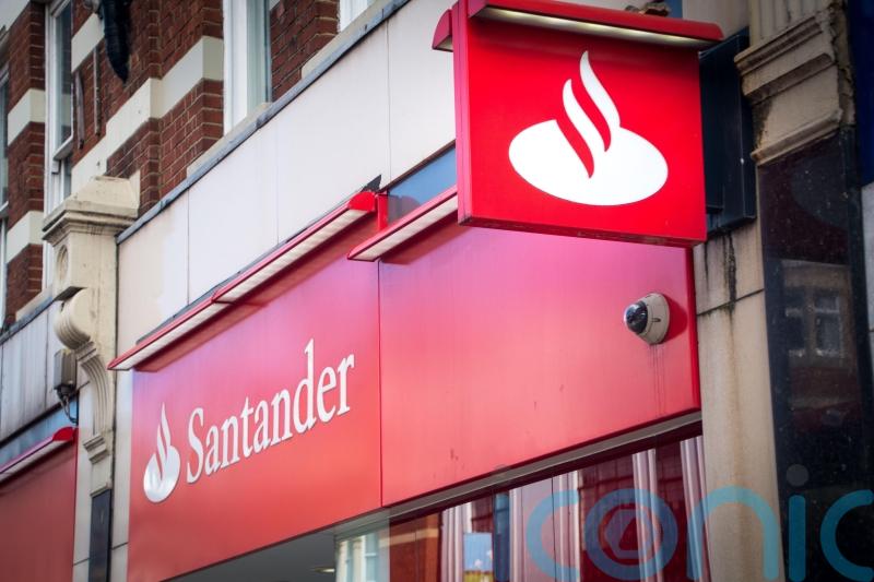 Santander to cut costs further as profits rise despite another motor finance hit