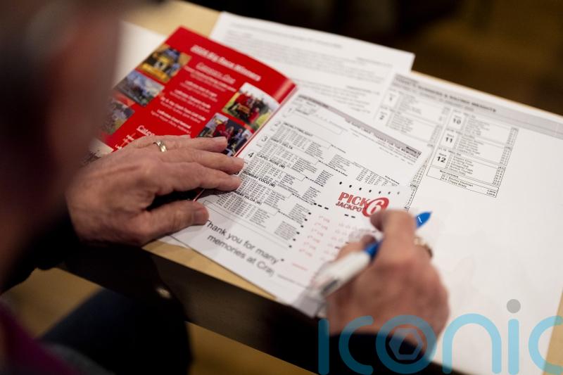 FTSE 100 tops 10,400 as Beazley and Entain soar