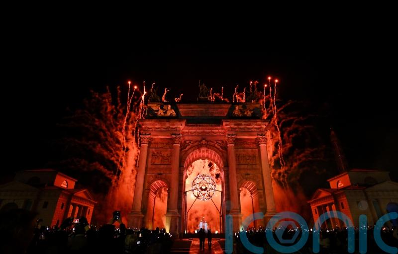 Winter Olympics opens in style with unprecedented double cauldron lighting