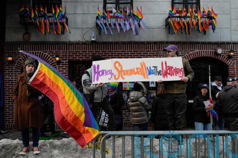 Rainbow flag raised at Stonewall monument in New York in defiance of Trump