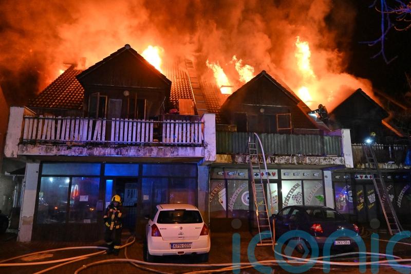 At least three dead and dozens hurt after blaze at apartments near Budapest