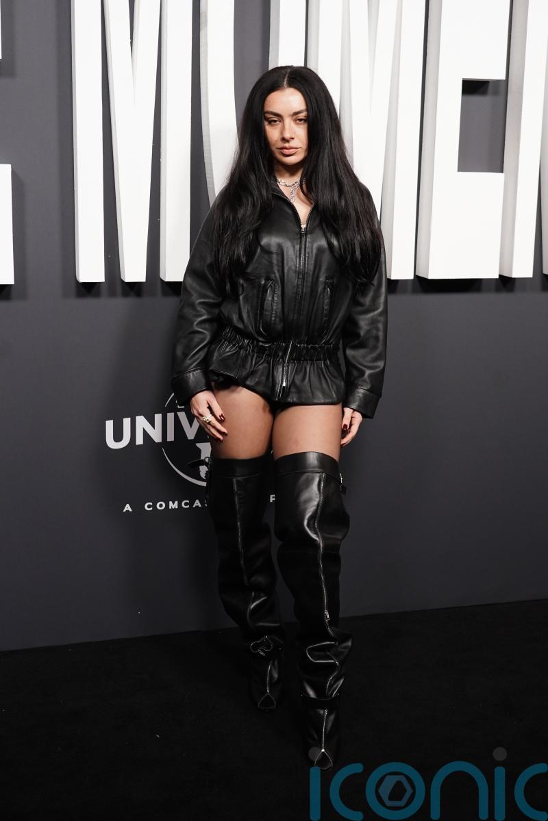 Charli XCX stuns in black leather ensemble at The Moment UK premiere
