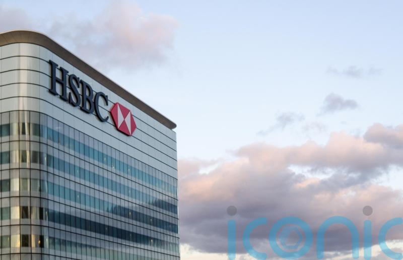 HSBC to meet &pound;1.1bn cost savings target early after cutting back senior roles