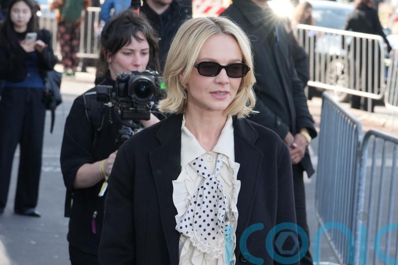 Stars turn out for Prada&rsquo;s blend of utility and glamour at Milan Fashion Week