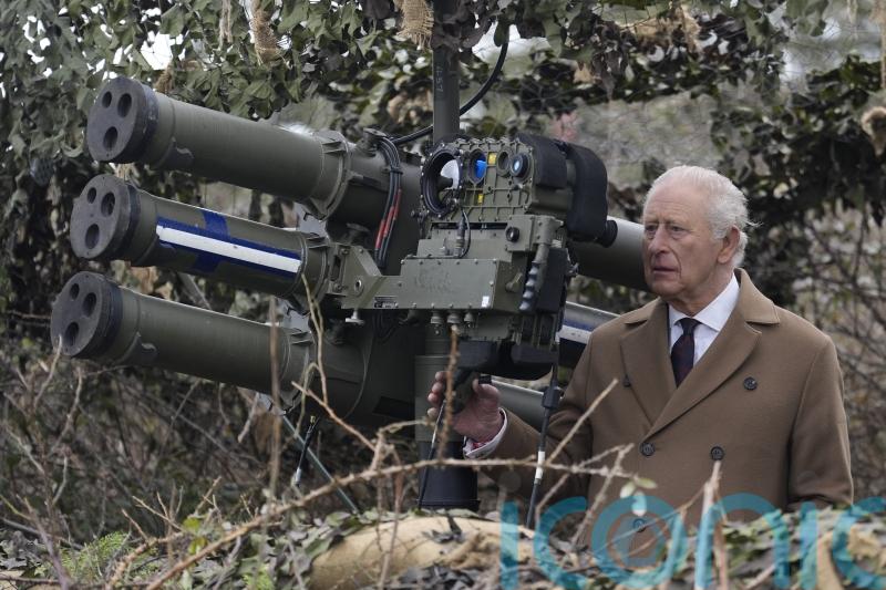 King takes part in air defence exercise and meets military families at barracks