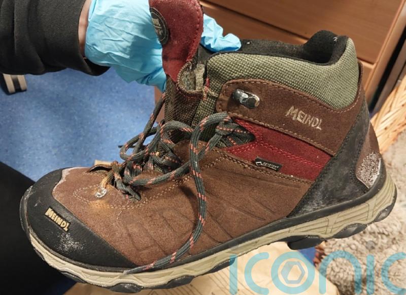 Police release image of footwear in bid to identify woman found dead off Iona