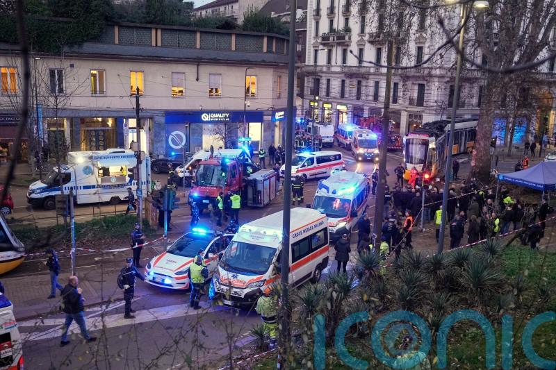 Two dead and dozens injured after tram derails in Milan