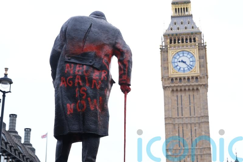 Man to face court on Monday after Churchill statue defaced with graffiti