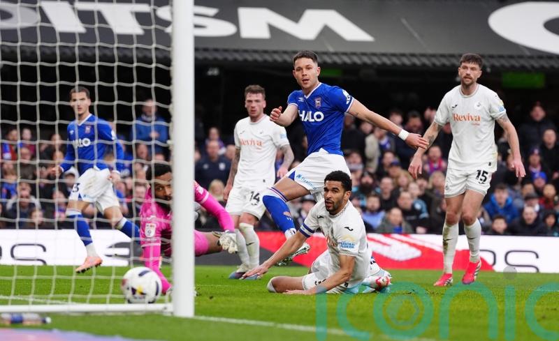 Ipswich maintain promotion push with comfortable victory over Swansea