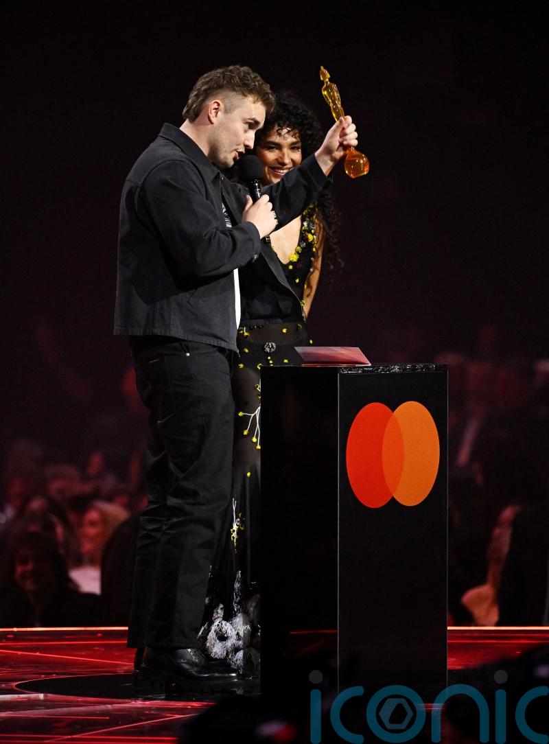 Olivia Dean and Sam Fender win song of the year as Brit Awards begin