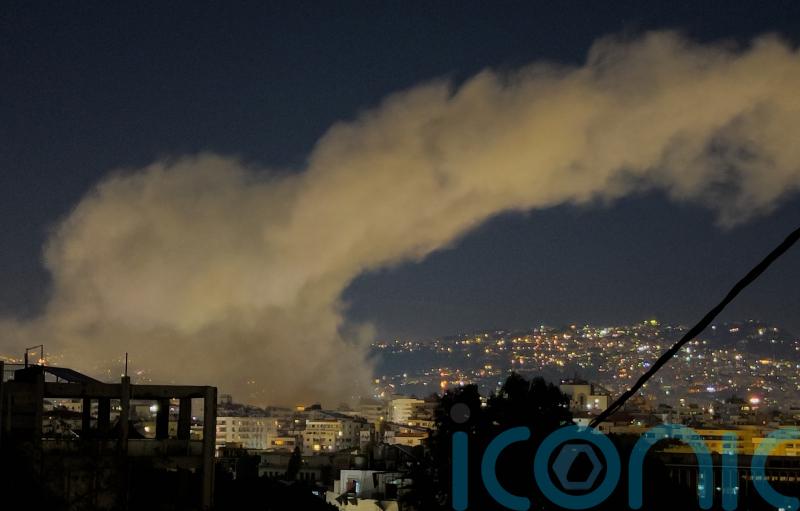 Israel launches strikes on Beirut after Hezbollah fires missiles across border
