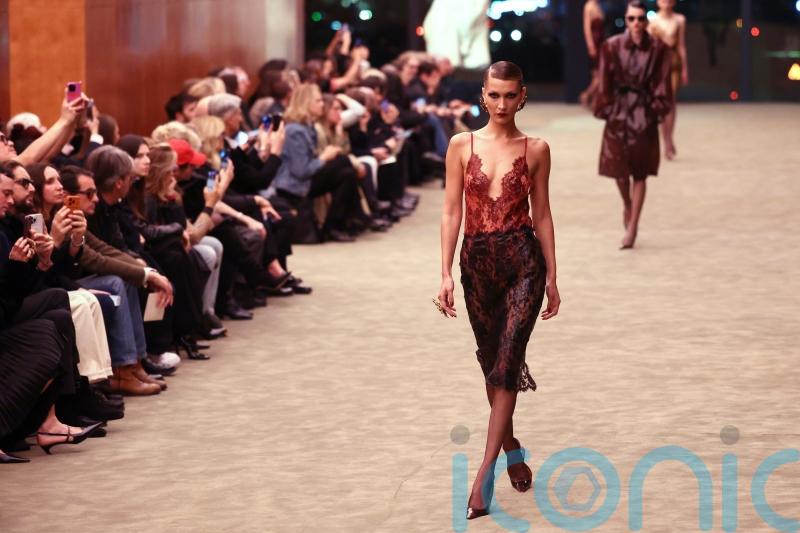 Bella Hadid walks Saint Laurent&rsquo;s tuxedo revival at Paris Fashion Week