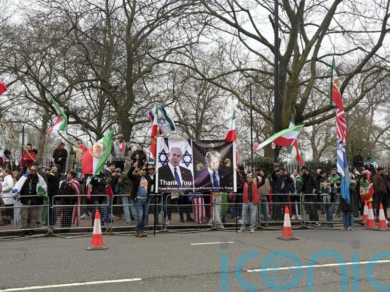 Demonstrators gather outside Iranian embassy in support of war