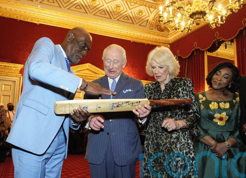 King jokes with Sir Viv Richards about his cricket attempts in Royal Navy