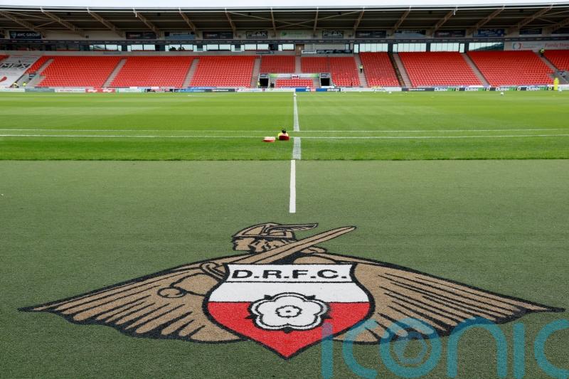 Doncaster hold off 10-man Blackpool to boost survival hopes